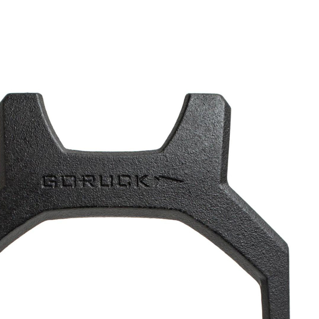 Close-up of a black metal plate with the word