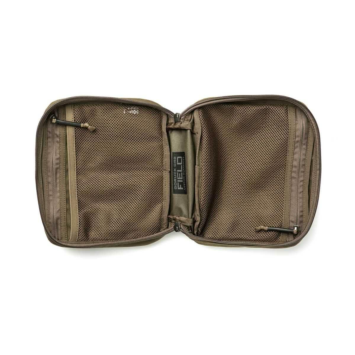 Open GORUCK Field Pocket with brown mesh zippered compartments and durable fabric interior