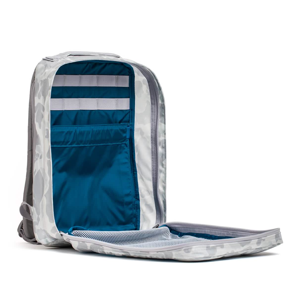 Open gray camouflage GR0 - Ripstop ROBIC® compact rucksack with blue interior pockets and a mesh compartment on the flap—ideal for minimalist everyday carry.