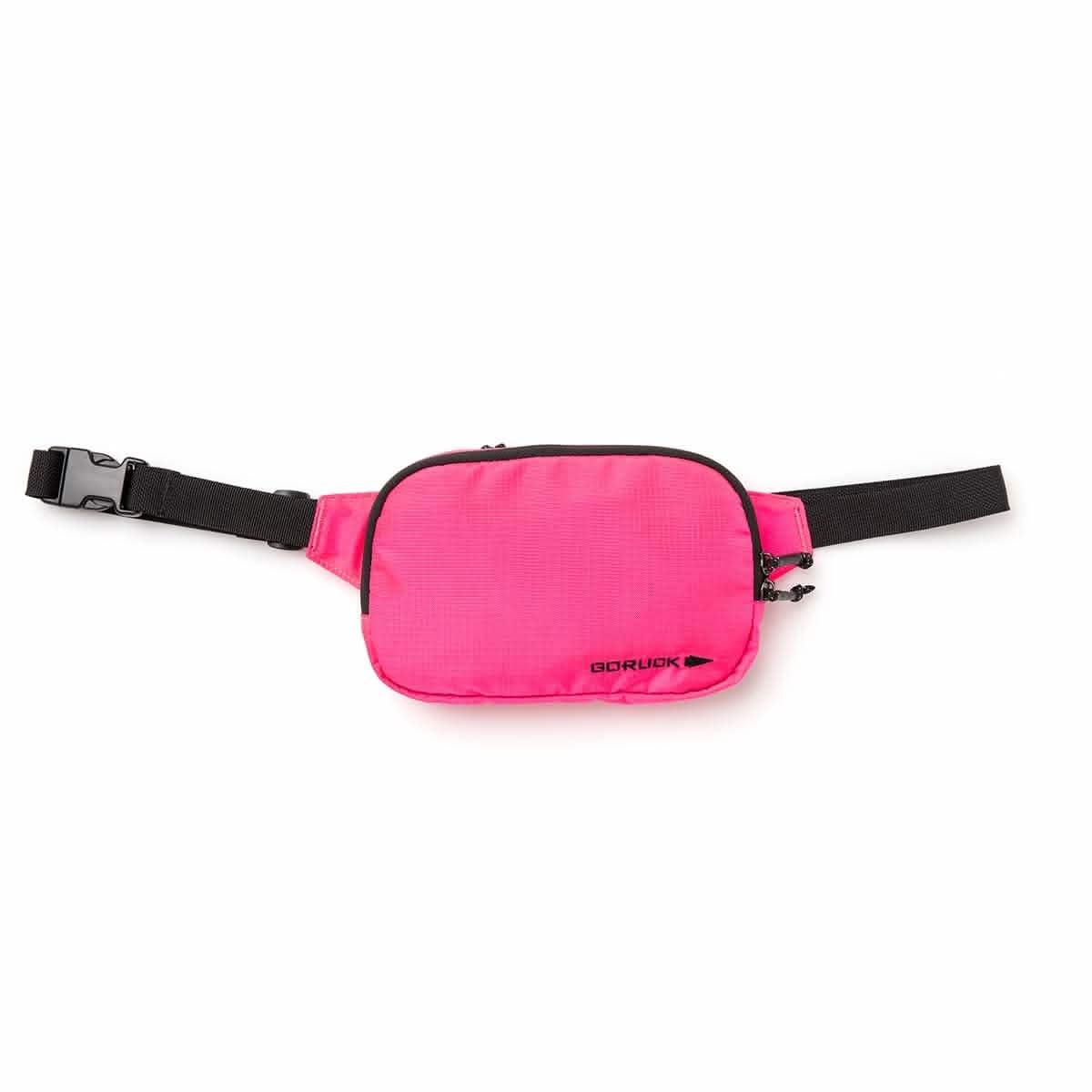 GORUCK hot pink large belt bag with black zippers and strap on white background