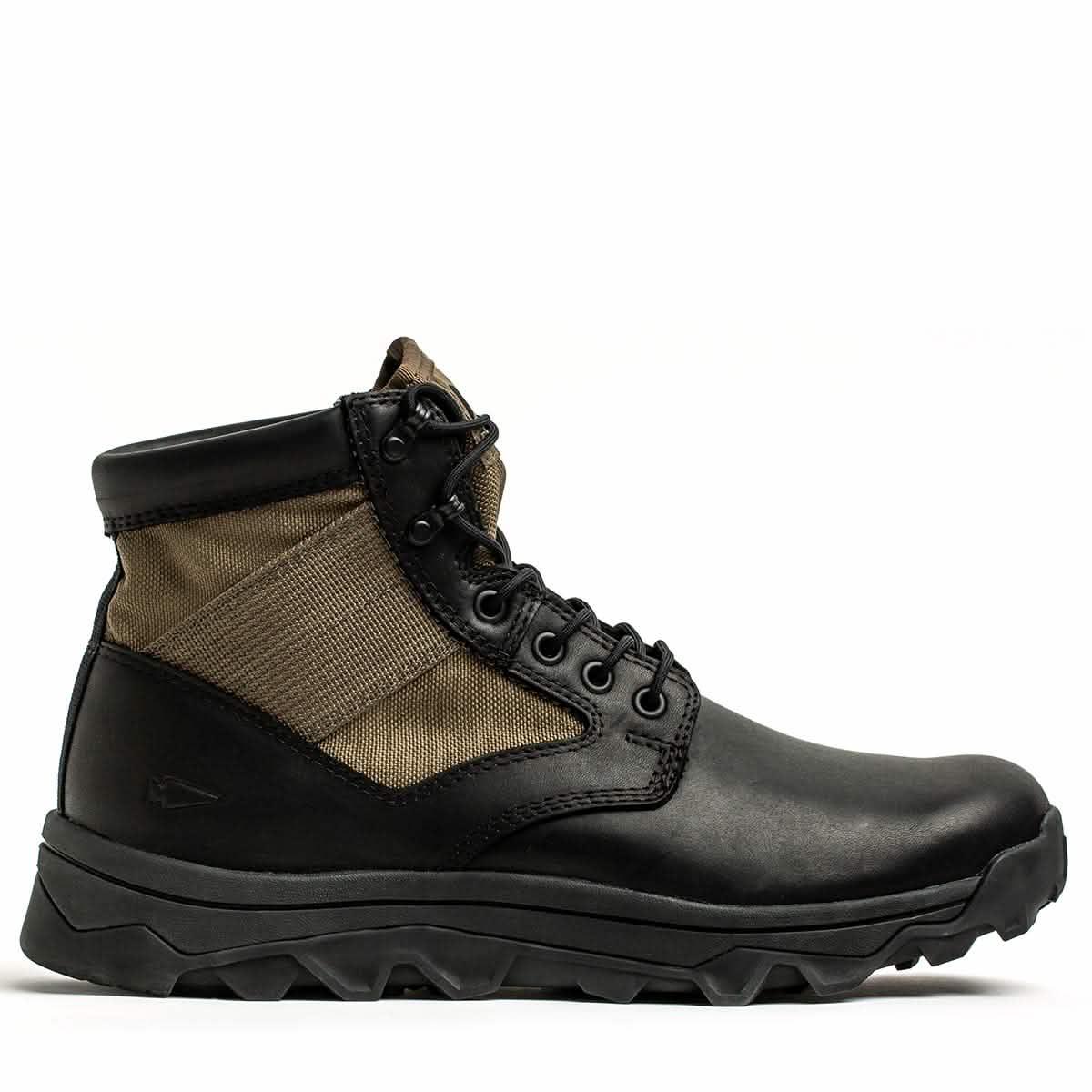 Side view of a black and olive rugged tactical boot with thick sole, ideal for tough outdoor rucking