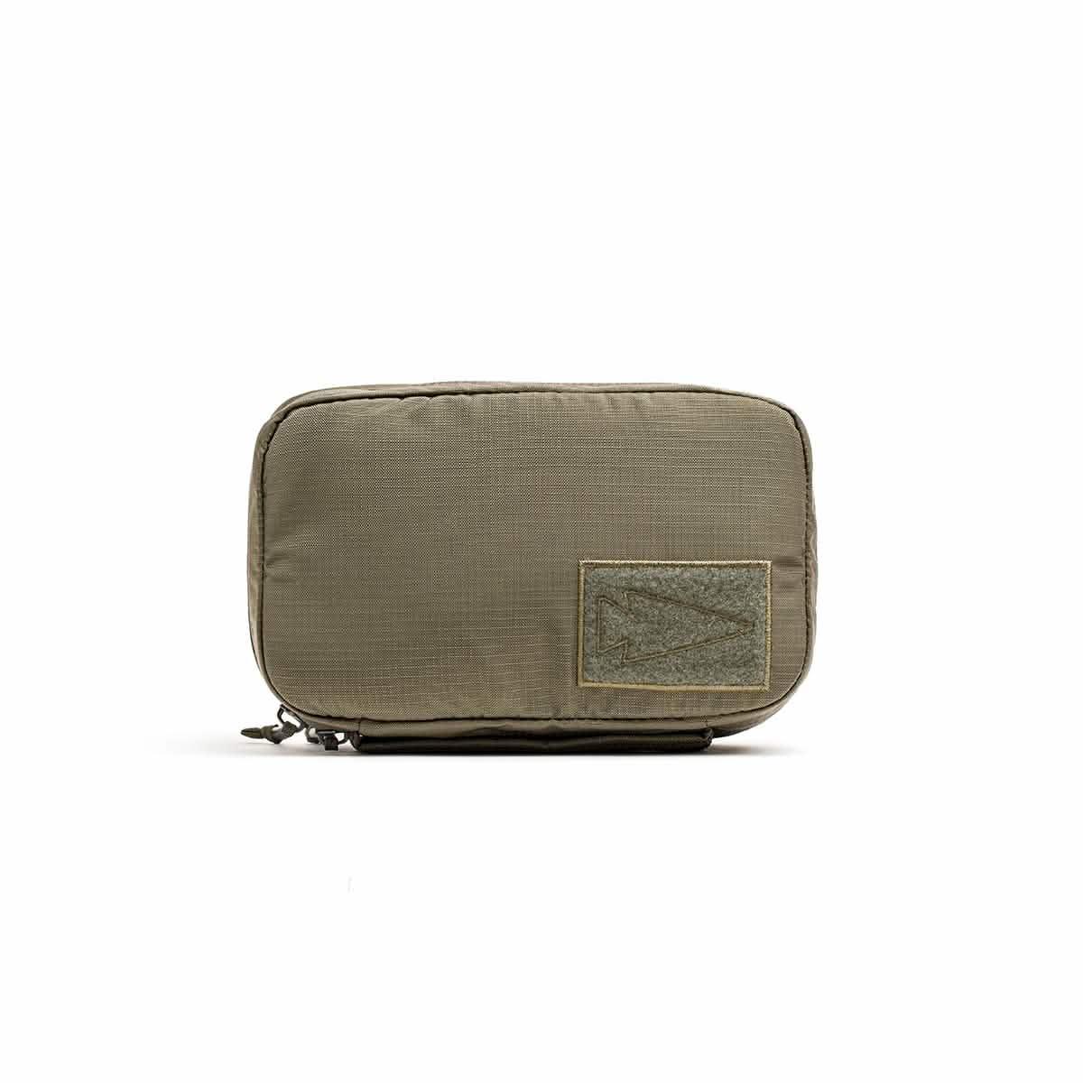 GORUCK small rugged pack pouch in earth tone ripstop fabric with stitched arrow patch