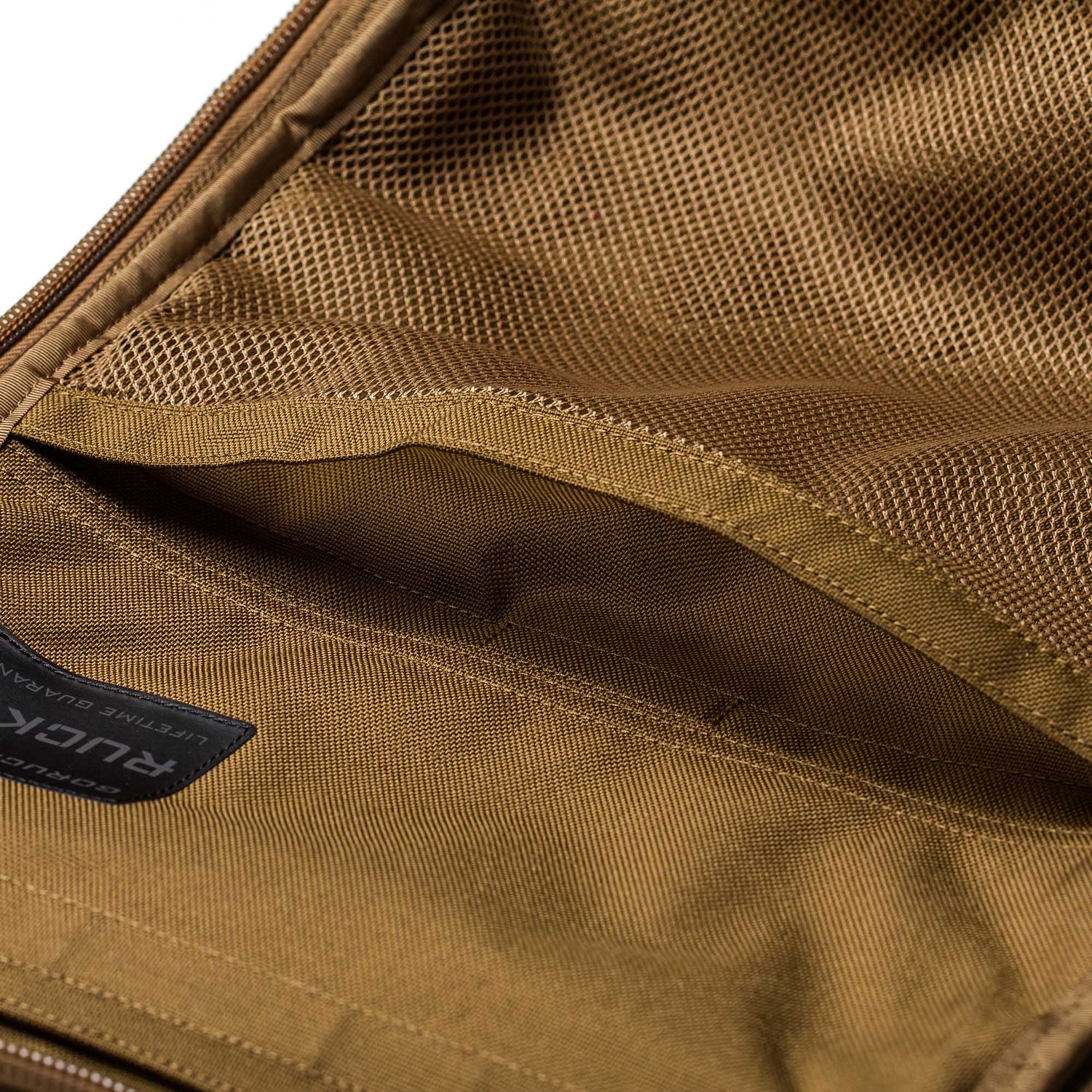 Close-up of an open Rucker 5.0 showing its inner mesh and fabric pockets, perfect for rucking enthusiasts.