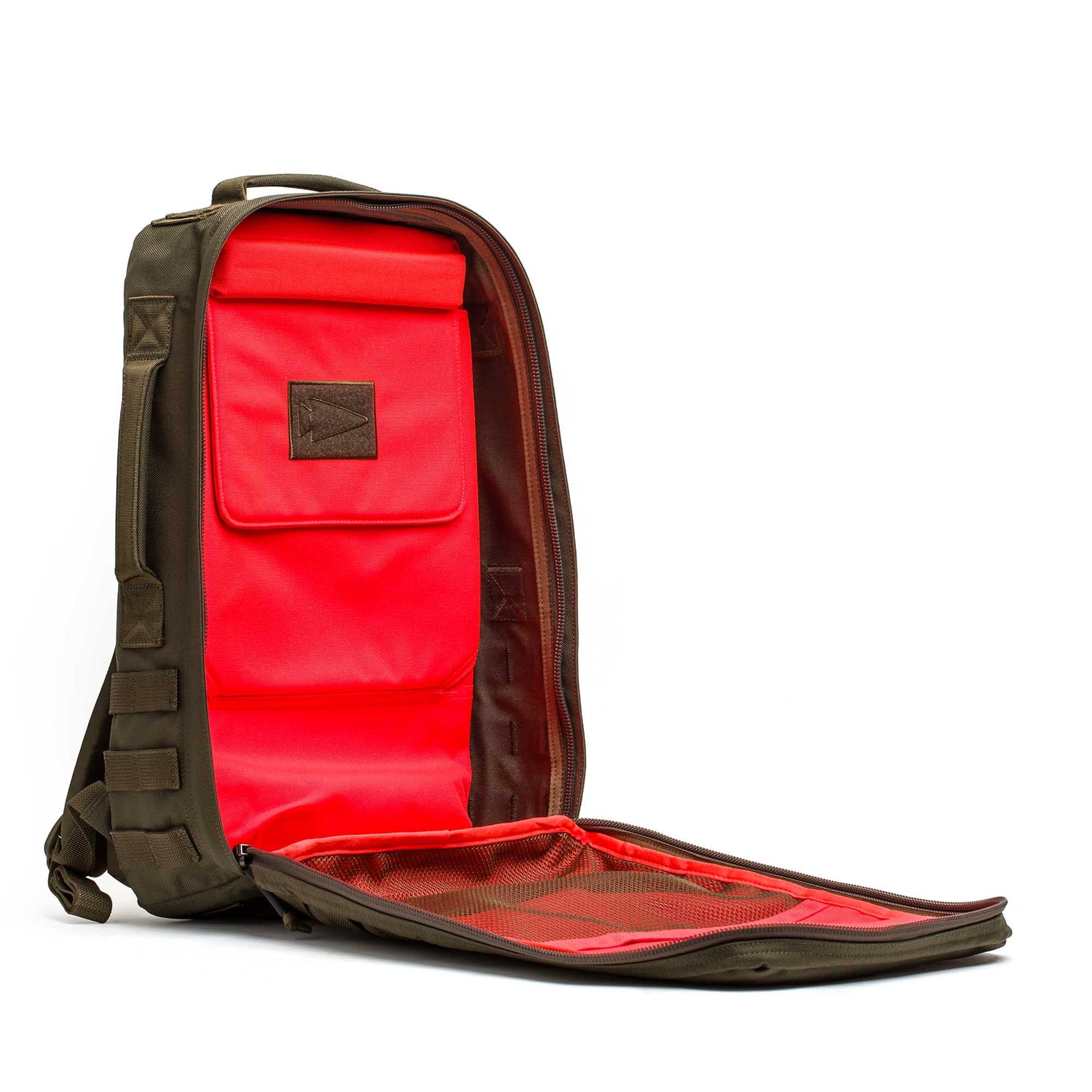 The Rucker 5.0 is a green rucksack with its front unzipped, showing a bright red interior and multiple compartments—ideal for rucking adventures.