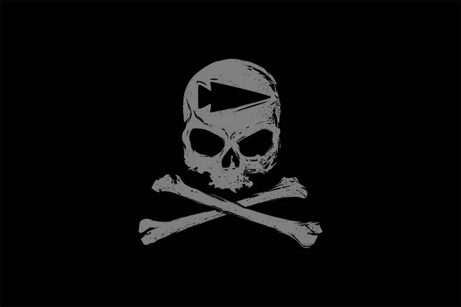 A skull and crossbones with a black play button symbol on the skull’s forehead, on a black background.