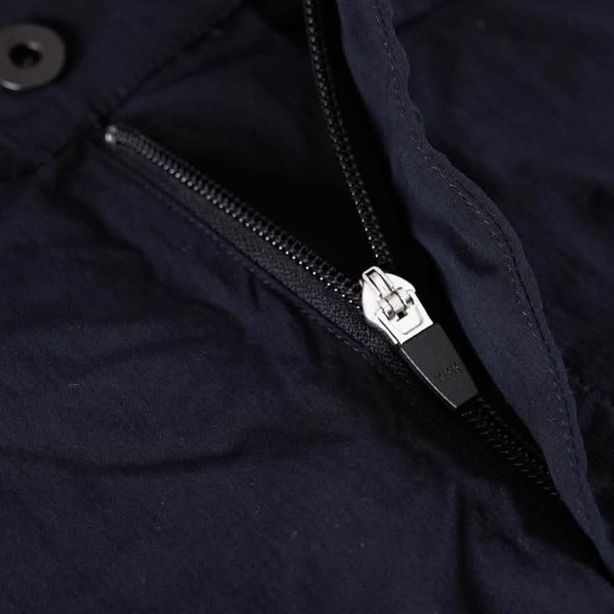 Close-up of durable black zipper on GORUCK tactical gear fabric