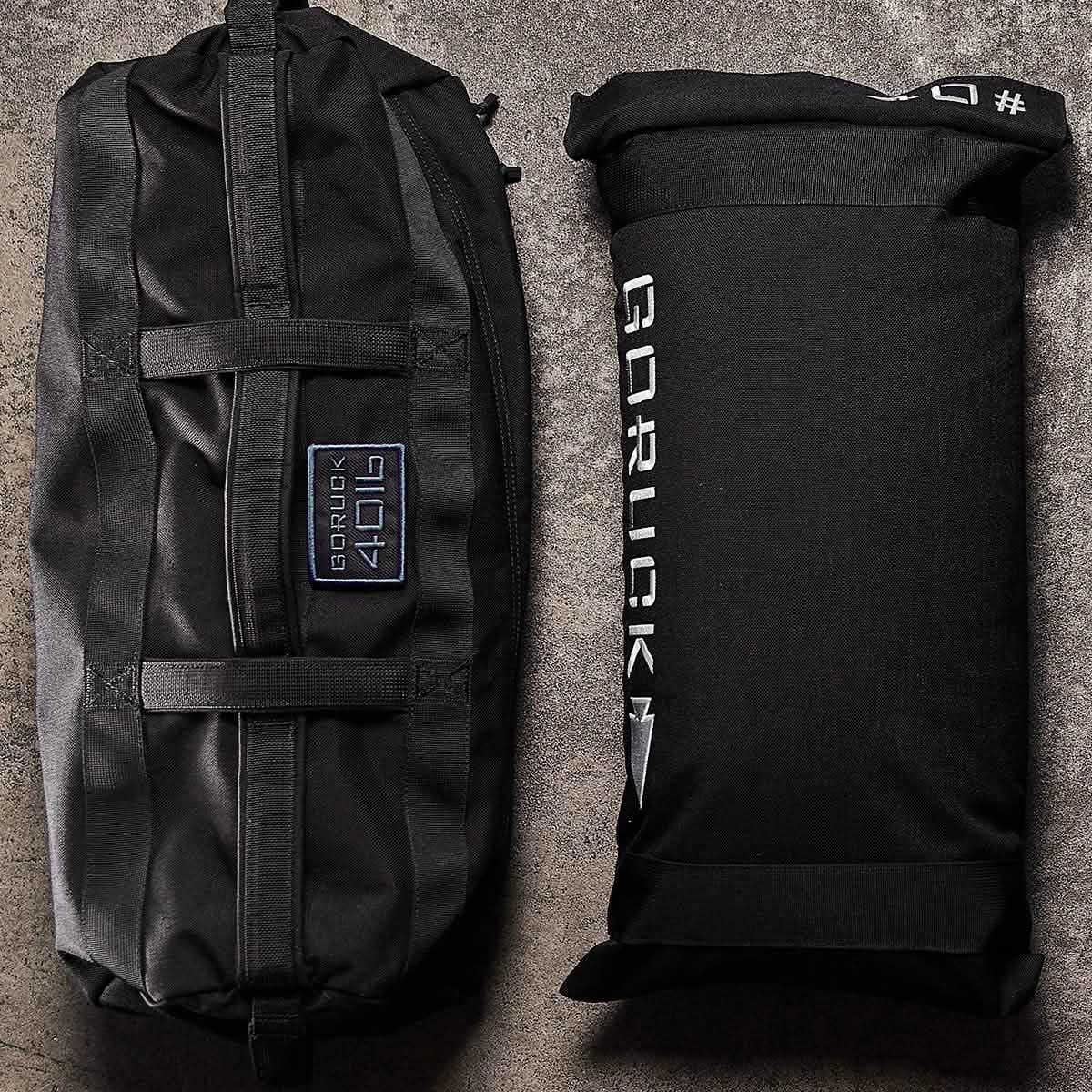 Black GORUCK 40-pound ruck plate with rugged fabric cover and durable carrying bag on concrete floor