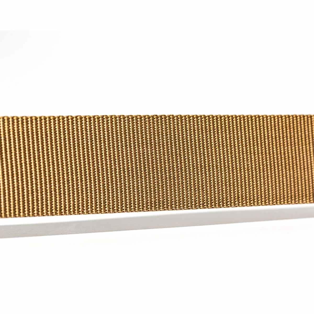 Close-up of a durable coyote brown nylon belt strap with a tightly woven texture, high-quality rucking gear