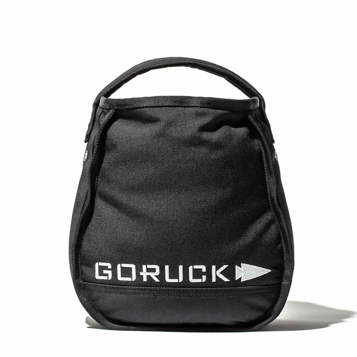 Black GORUCK branded rucking gear bag with top handle on white background