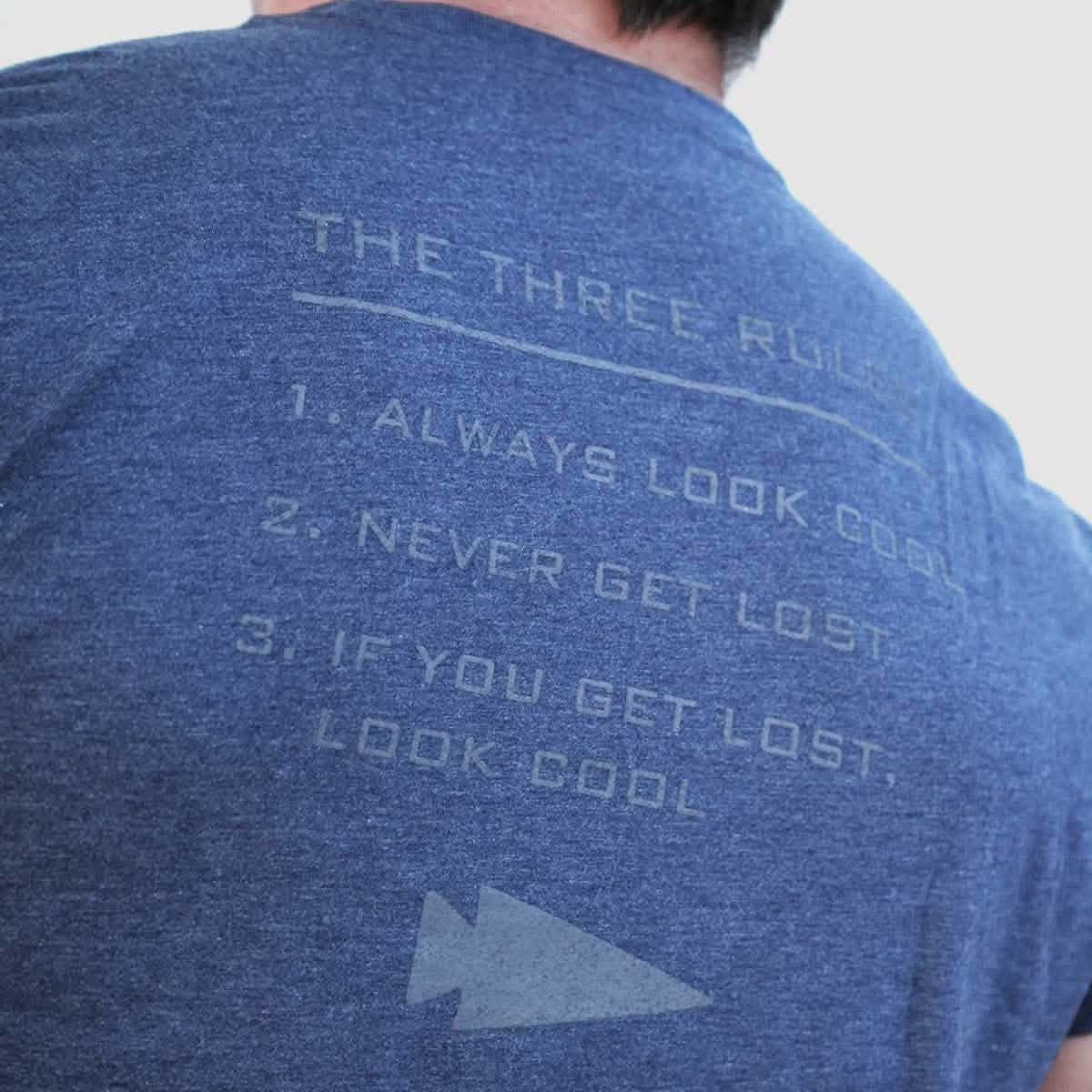 Close-up of blue GORUCK t-shirt back with The Three Rules text for rucking gear