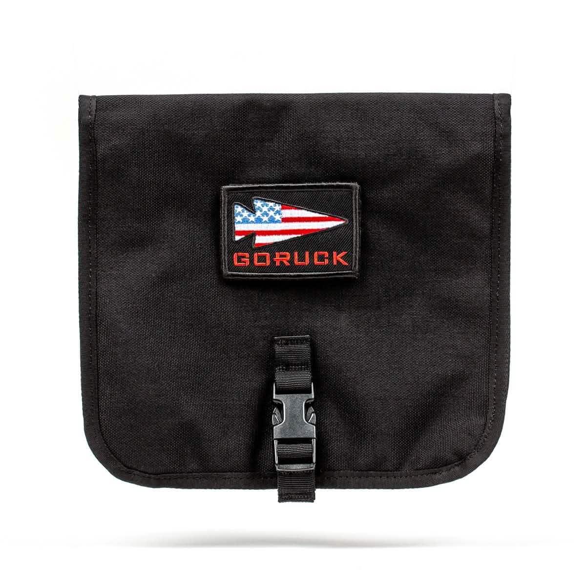 Black durable GORUCK Wire Dopp Kit with American flag arrow patch and front buckle closure