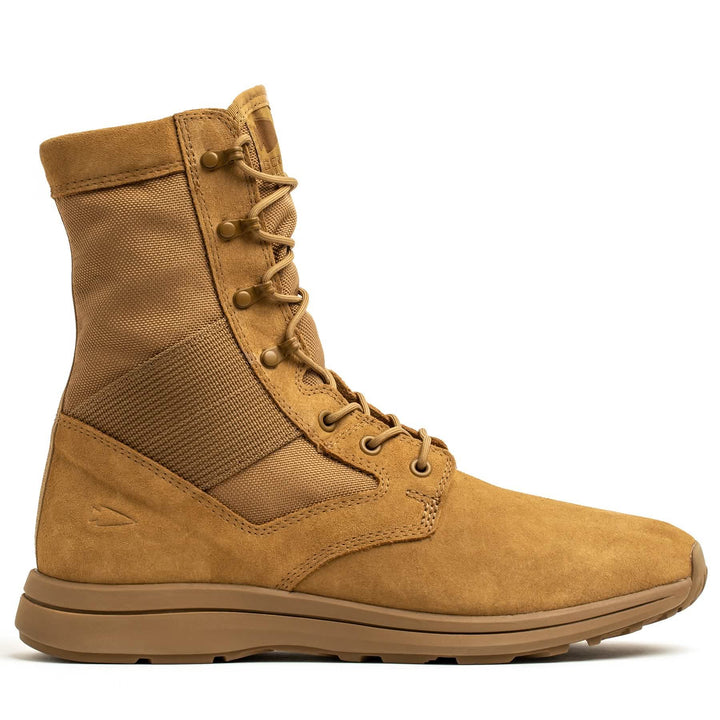 The MACV-1 Hi-Speed - High Top combat boot by GORUCK in tan features a high ankle, lace-up design, and reinforced eyelets. This AR670-1 compliant boot is equipped with a sturdy sole and a fabric panel on the side for enhanced flexibility and comfort, making it an ideal choice for those in search of lightweight rucking boots.