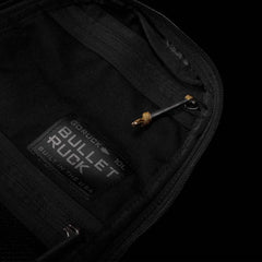 GORUCK Bullet Ruck 10L interior with branded patch and zipper on black fabric