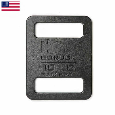 Black Ruck Plates (10 LB) with rectangular cutouts and a small US flag in the top left. Durable design for rucking weights; ideal for use with GORUCK packs and versatile Ruck Plates training.