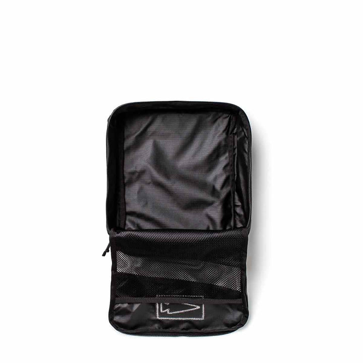 The GORUCK Shoe Bag - Ripstop ROBIC® is presented against a white background, featuring an open black design with an internal mesh pocket and water-resistant protection.