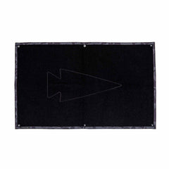 The GORUCK Patch Board is a rectangular black display featuring a subtle outlined arrowhead in the center and metal-reinforced holes along the edges, ideal for showcasing your favorite velcro patches.