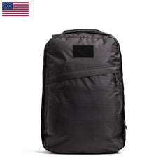 Black GORUCK rucking backpack with diagonal zippered front pocket on white background