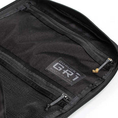The GR1 USA - Cordura (The Original Ruck) from GORUCK in black features interior pockets and zippers, proudly displaying its "GORUCK GR1 Built in the USA" label, and is equipped with a Special Forces grade, bombproof laptop compartment.