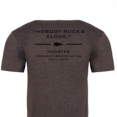 Back of the Monster Forever Tee // PREORDER (brown) with black text: “NOBODY RUCKS ALONE.” and smaller text below.