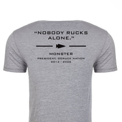 Gray Monster Forever Tee (PREORDER) – Back features black “NOBODY RUCKS ALONE.” text and additional details beneath a small arrow graphic.