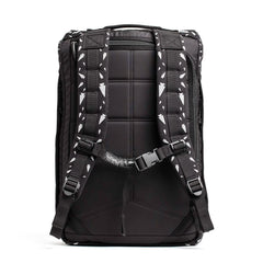 GORUCK black rucksack with padded back and adjustable shoulder straps featuring white arrow pattern