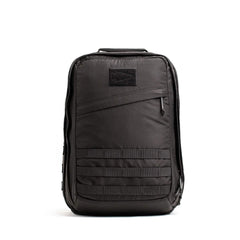 GORUCK black rucksack backpack with MOLLE webbing, front zipper pocket, and rugged design