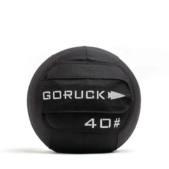 The GORUCK Sand Medicine Ball, featuring a black design with a top handle and white text displaying GORUCK and 40# on the side, is perfect for your home gym. Ideal for strength training and core stability, this versatile tool enhances any workout routine.