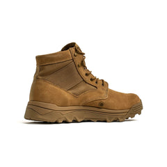 Experience the side profile of the MACV-2 - Mid Top - Coyote by GORUCK, featuring a tan hue with a durable triple compound outsole. The design boasts textured fabric panels, a lace-up front, and reinforced stitching. This jungle boot is perfect for outdoor or tactical use.
