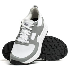 The Men's Rough Runner - White + Speed Grey running shoes by GORUCK showcase a white and speed grey design. One shoe is upright, highlighting the textured black sole, while the other rests at an angle. These Rough Runner™ shoes come with white laces and a white mesh upper accented by gray for added durability and style.