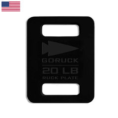 A black 20lb ruck plate with two slots, ideal for the Basic Rucker + FREE Plate or any rucking backpack, is shown on a white background with a US flag in the corner.