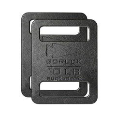 Two black metal ruck plates from the Basic Rucker Bundle, ideal for weighted training or rucking, overlap on a white background.