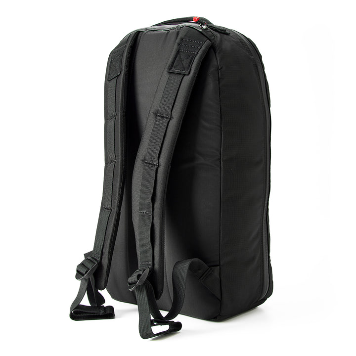 The Bullet Ruck - Ripstop ROBIC® by Michael Easter, made from lightweight 420D ROBIC® Ripstop Nylon, features padded straps and a sleek, minimalist design seen from the back.