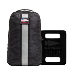 The Basic Rucker + FREE Plate is a black backpack with a U.S. flag patch and includes a GORUCK 20LB Ruck Plate, ideal for weighted training.