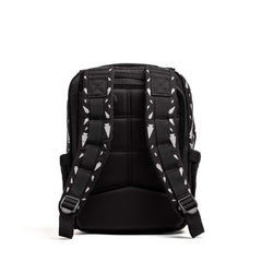 Back view of black GORUCK backpack with white arrow pattern and padded adjustable shoulder straps