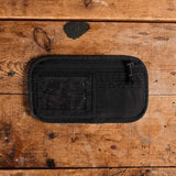 GORUCK black Admin Panels ID card organizer on rustic wooden surface