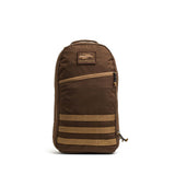 The Bullet Ruck Classic - Ballistic Nylon Cordura is a brown 15L daypack with a front zipper pocket, patch logo, and bottom horizontal webbing—ideal as a streamlined backpack or rugged rucking pack.