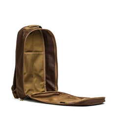 Open brown Bullet Ruck Classic - Ballistic Nylon Cordura backpack stands upright with its main compartment unzipped, revealing an empty 15L interior—this streamlined daypack is ready for any adventure.