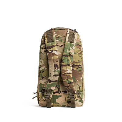 A rear view of the Bullet X-PAC daypack in camouflage, highlighting its shoulder straps, buckles, and durable AquaGuard zippers.