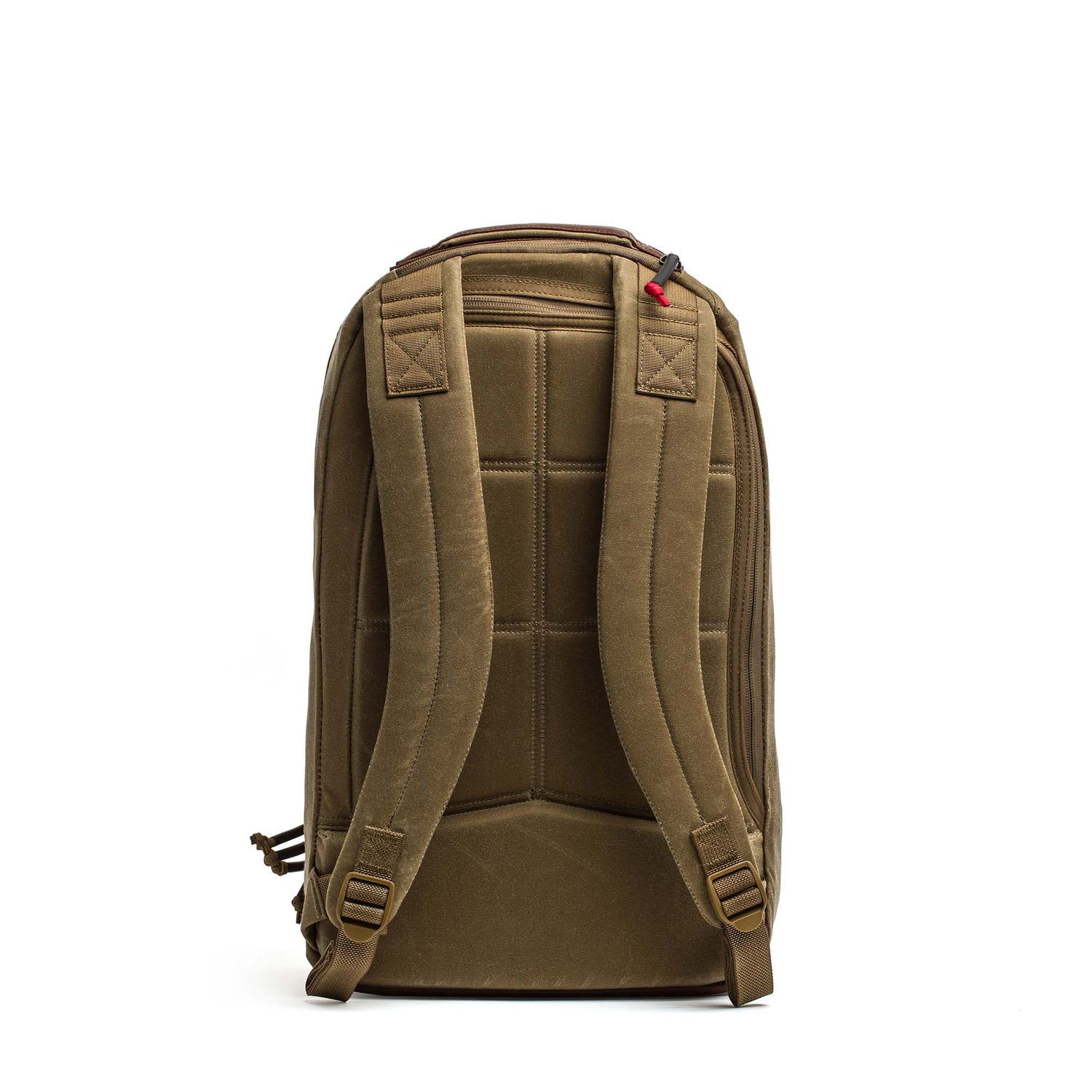 The Double Compartment Bullet Ruck - Heritage Waxed Canvas - 18L is shown from the back with padded straps and back panel against a white background—an ideal everyday travel daypack.