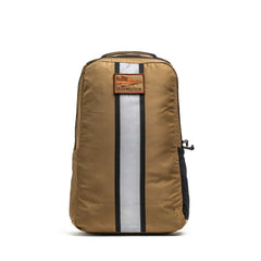 Tan Basic Rucker® backpack with a vertical reflective stripe and a front "GORUCK" patch, shown from the front.