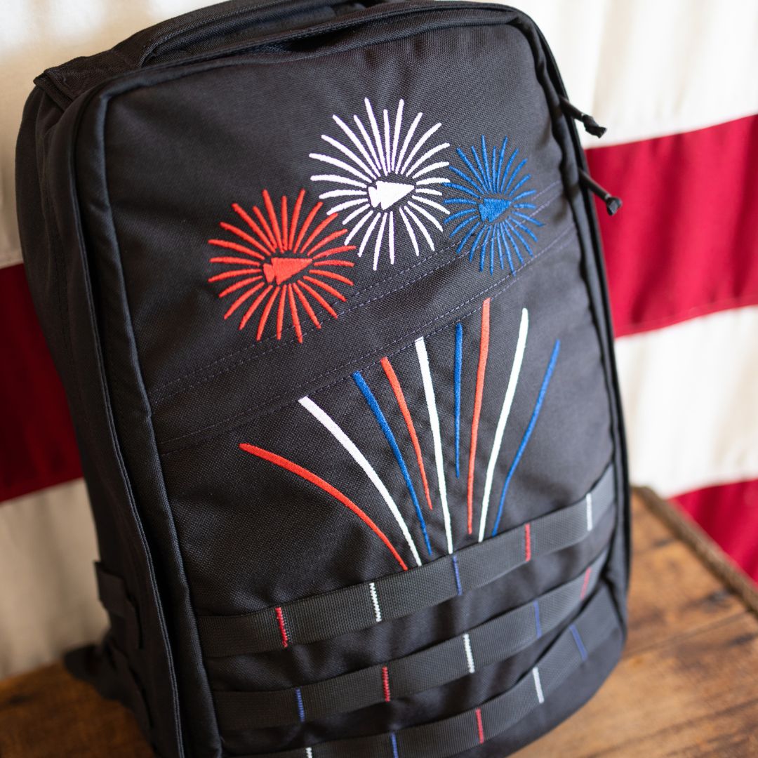 Fireworks GR1 21L - Built by Scars, handmade in FL with red, white & blue fireworks embroidery on black.