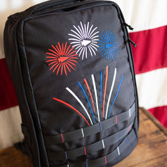 Fireworks GR1 21L - Built by Scars, handmade in FL with red, white & blue fireworks embroidery on black.