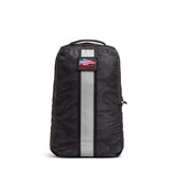 The Basic Rucker is a black GORUCK backpack featuring a gray vertical stripe, camouflage pattern, and an American flag patch on the front—ideal for everyday adventures.