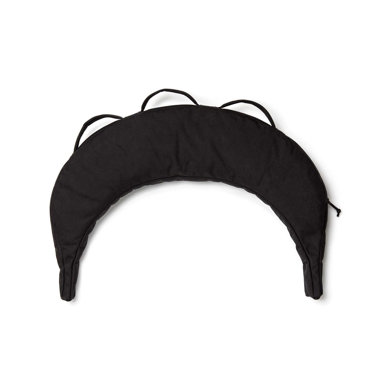A black Bulgarian Sandbag with a crescent shape and three fabric loops on top, shown from above against a white background.