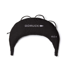 The Bulgarian Sandbag features a reinforced black design with handles, a crescent shape for versatile workouts, and a white "GORUCK" logo.