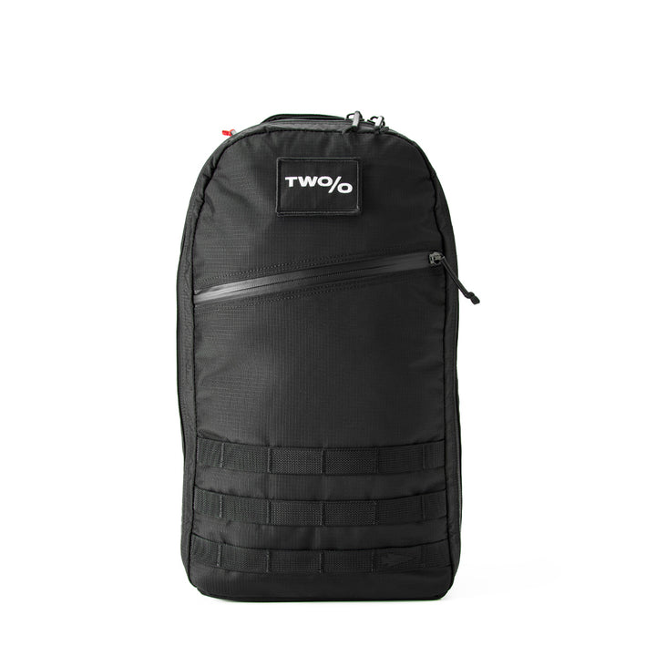 Meet the Bullet Ruck - Ripstop ROBIC® by Michael Easter, made from sturdy 420D ROBIC® Ripstop Nylon. Sporting a stylish "TWO/O" logo and a handy diagonal front zipper pocket, this lightweight backpack is ideal for all your adventures.