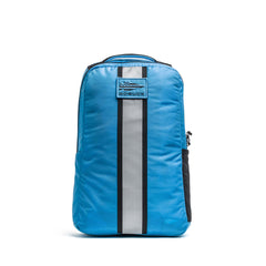 The Basic Rucker® is a bright blue backpack with a reflective vertical stripe and front GORUCK logo patch—ideal for rucking or daily use.