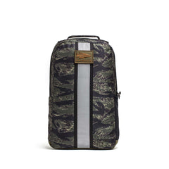 The Basic Rucker® features a camouflage pattern, vertical reflective stripe, tan front logo patch, and is designed to carry a Ruck Plate®.