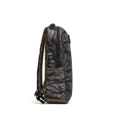 Side view of the Basic Rucker® rucking backpack in a camouflage pattern, featuring a front zipper, Ruck Plate® compatibility, and adjustable shoulder straps.