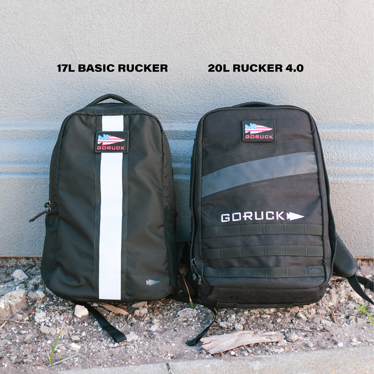 Two black GORUCK Basic Rucker® backpacks—a 17L and a 20L—stand side by side against a wall, ready for your next challenging rucking adventure.